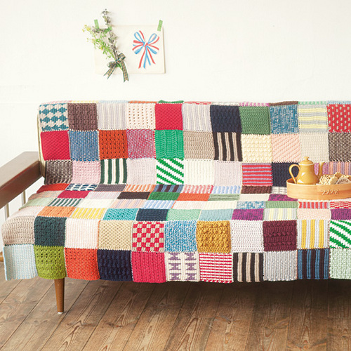 amazing crocheted blanket on couch