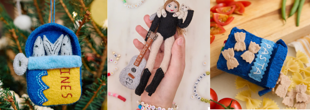 Christmas ornaments made from felt - a tin of sardines, Taylor Swift with a cat and guitar, a box of farfalle pasta