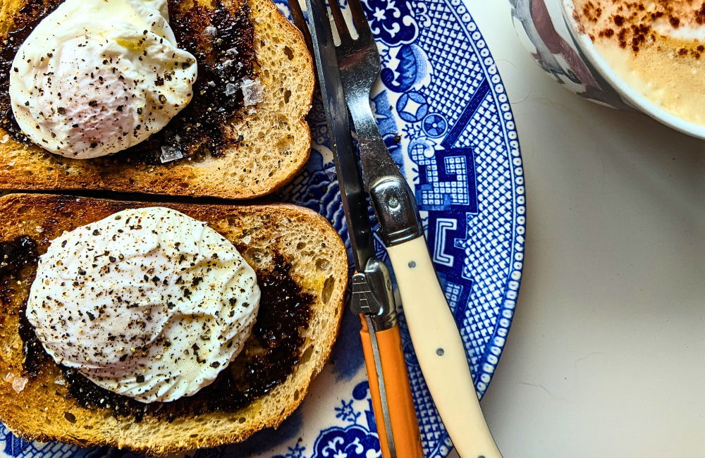 Poached eggs on Promite toast