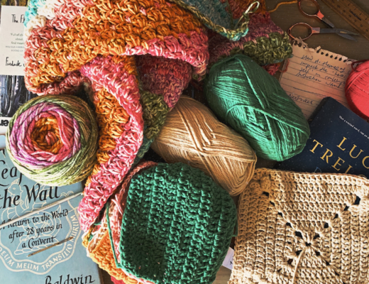 Pip's crochet, yarn, some books, notes and things