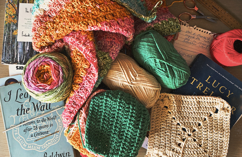 Pip's crochet, yarn, some books, notes and things