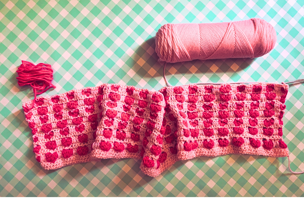 Pip's heart motif crocheted blanket
